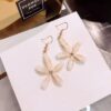 White Flower Drop Earrings or White Flower Dangle Earrings.