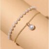 Double Layered Pearl and Gold Chain Bracelet.
