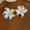 White Flower Stud Earrings or Floral Stud Earrings.