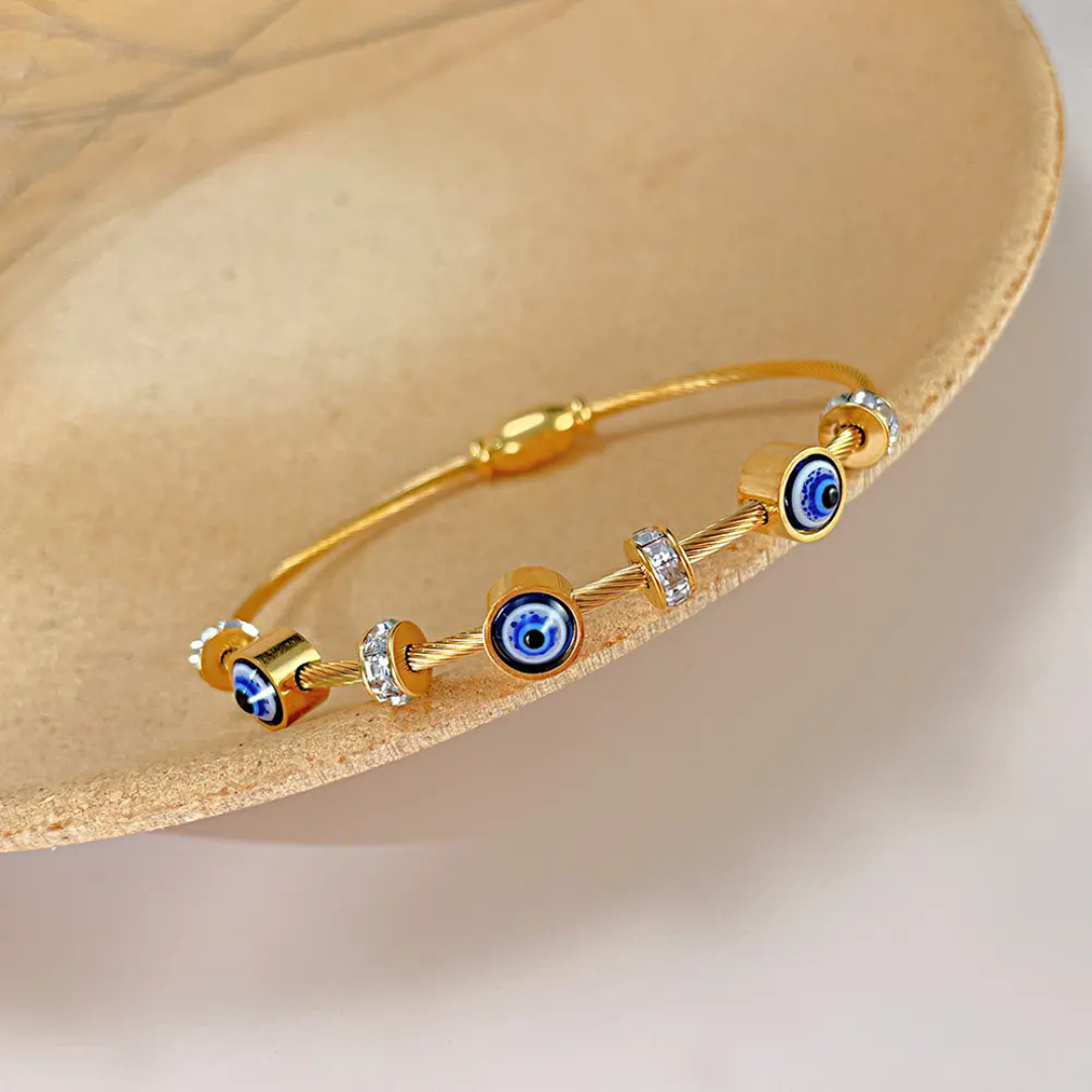 Gold-Plated Evil Eye Bracelet with Zircon Studded Charms.