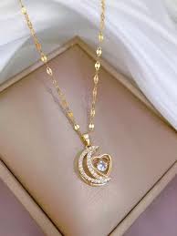 gold-plated alloy necklace with a crescent moon and heart
