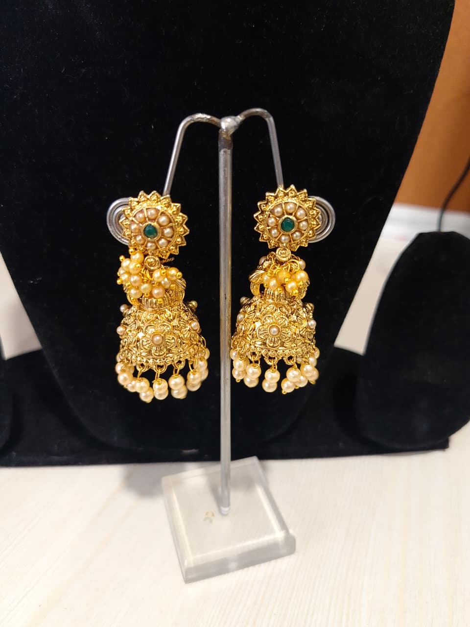 These earrings are a type of jhumka