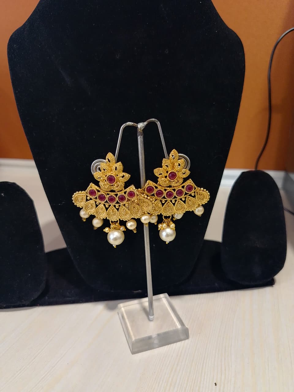 This is a pair of traditional Indian earrings, often referred to as jhumkas or chandbalis - Image 5