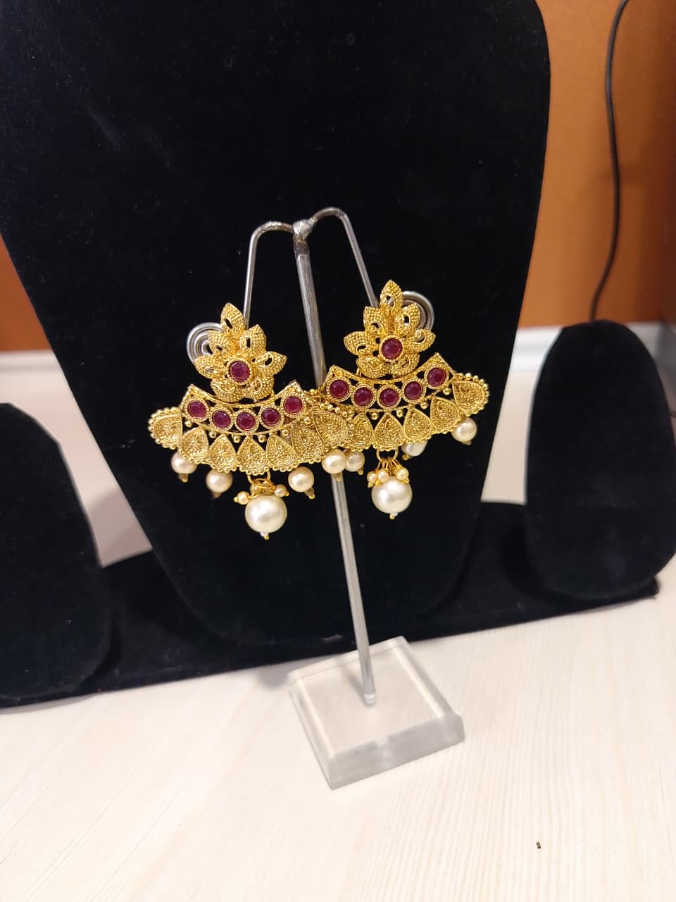 This is a pair of traditional Indian earrings, often referred to as jhumkas or chandbalis - Image 2